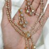 An elegant white stone necklace set